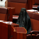 Senator Pauline Hanson wears a burqa during question time in the Senate chamber at Parliament House in Canberra, Australia, Thursday, Aug. 17, 2017.